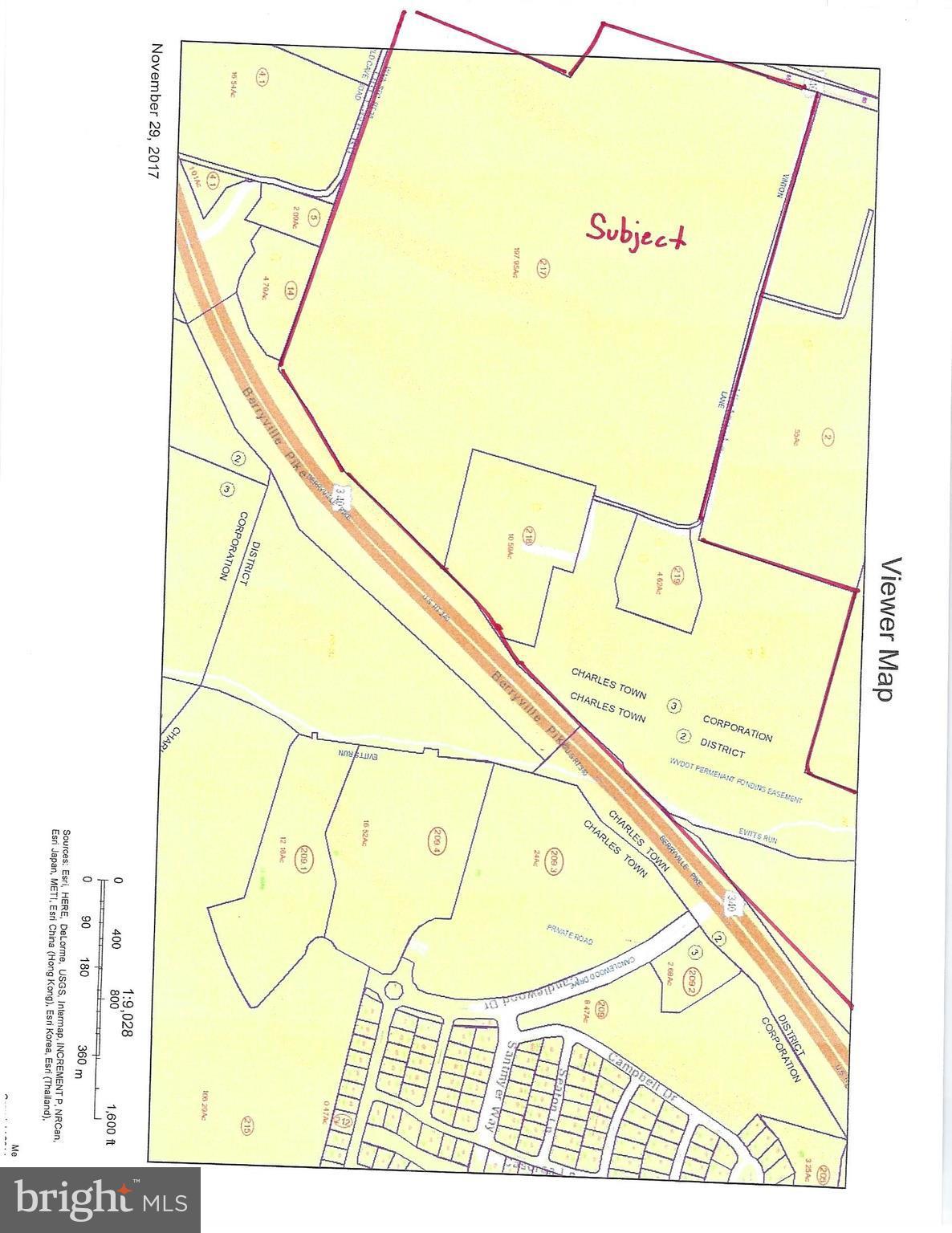 Augustine Avenue Charles Town, WV 25414 - Photo 2 of 6 a picture of a room with a white wall and a large window