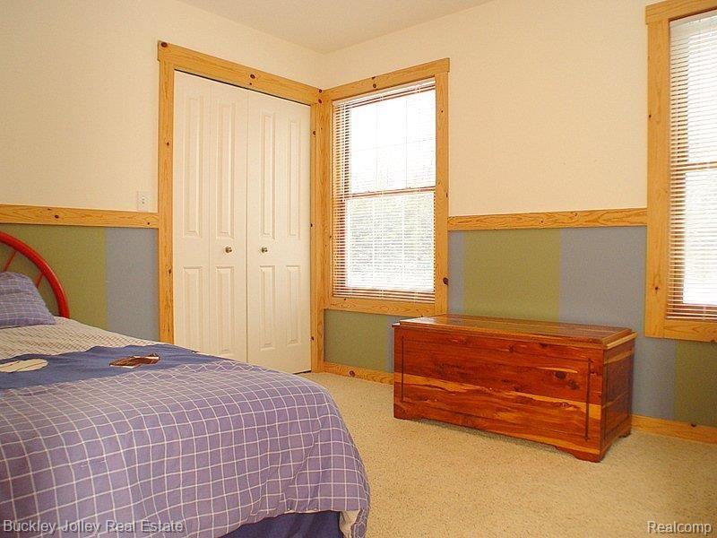 9101 North Latson Road Howell, MI 48855 - Photo 11 of 16 Guest Bedroom