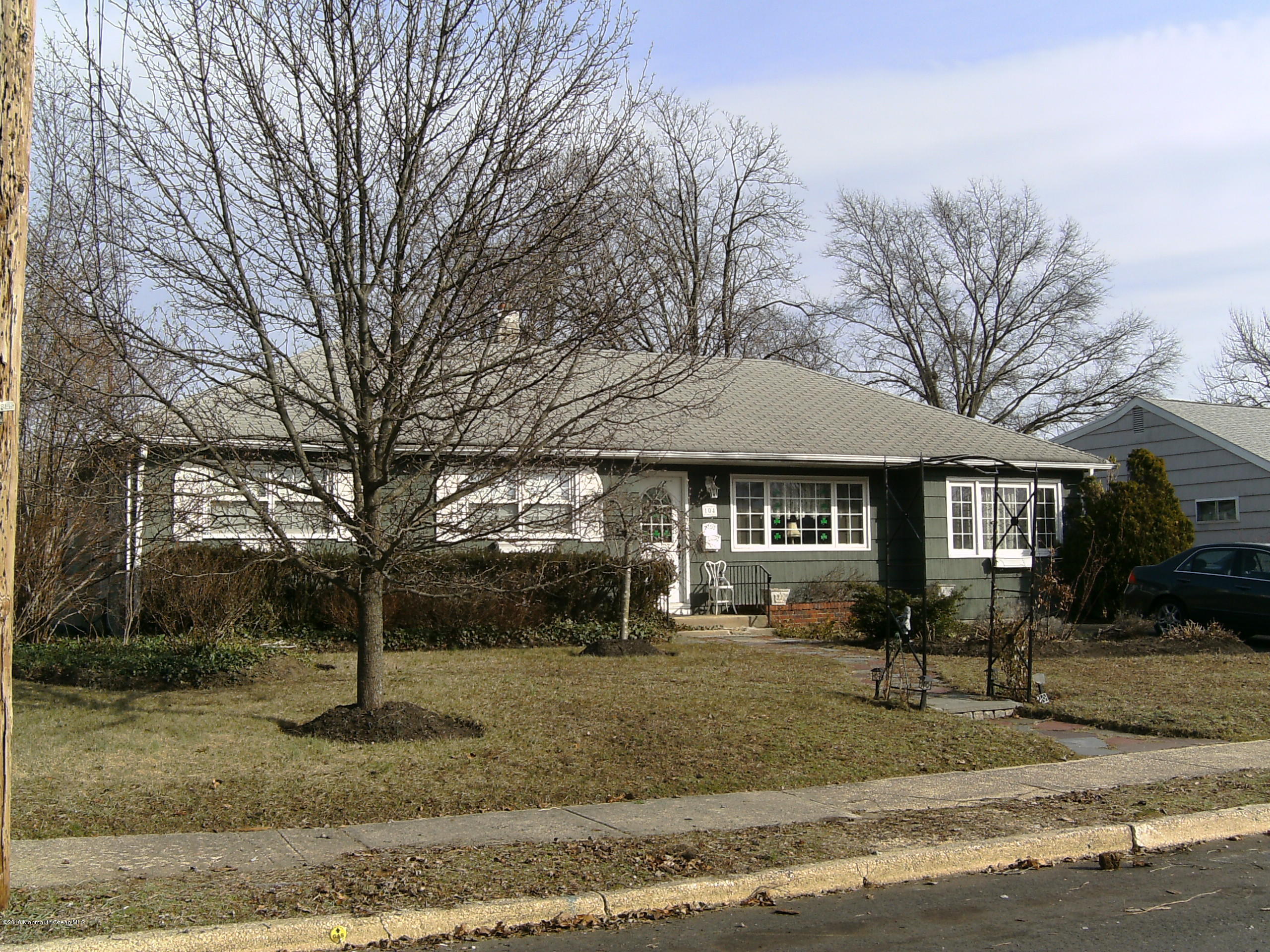 104 Meadowbrook Road Spring Lake Heights, NJ 07762 - Photo 18 of 22 a front view of a house with a yard