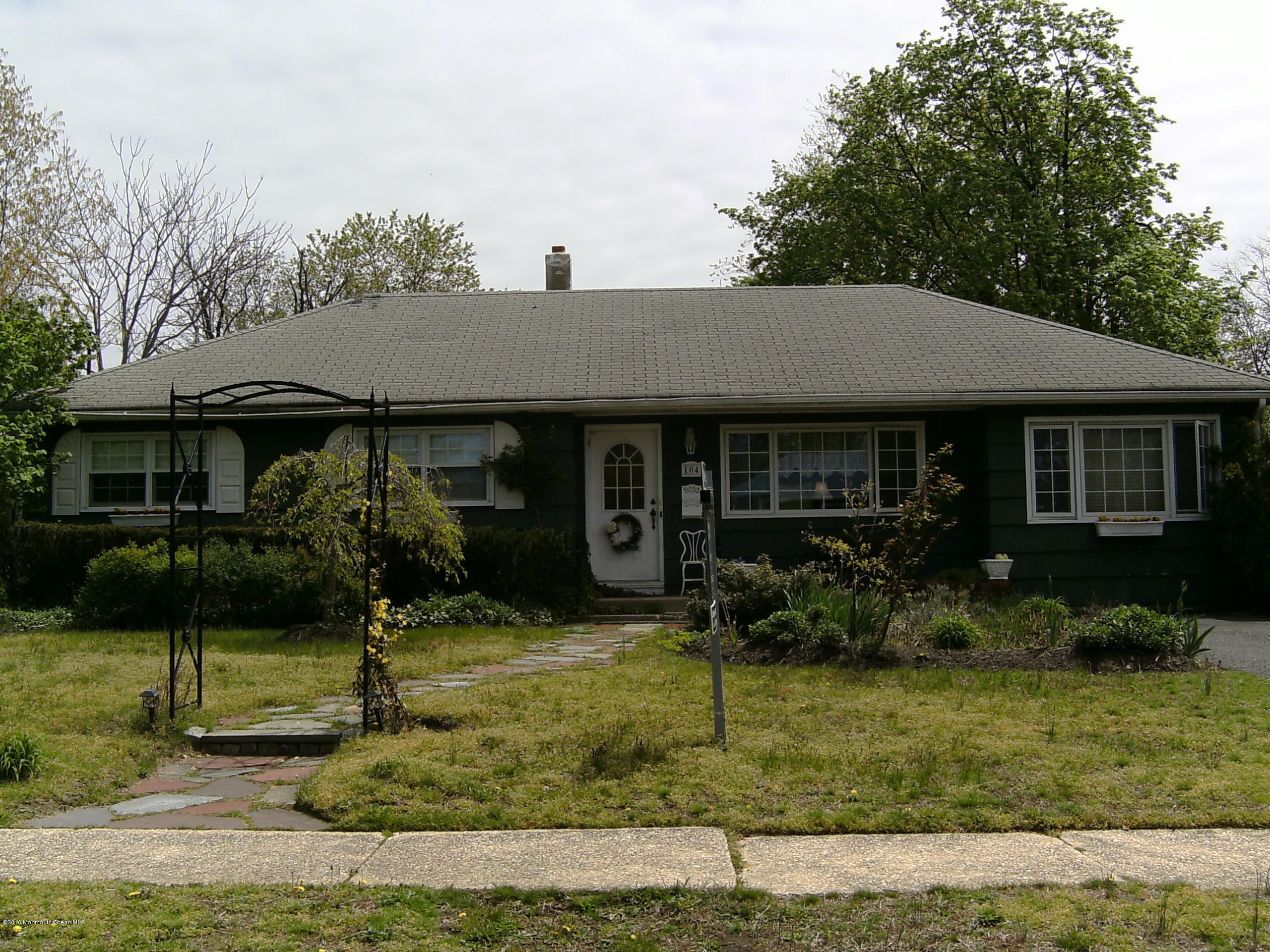 104 Meadowbrook Road Spring Lake Heights, NJ 07762 - Photo 21 of 22 a front view of a house with garden