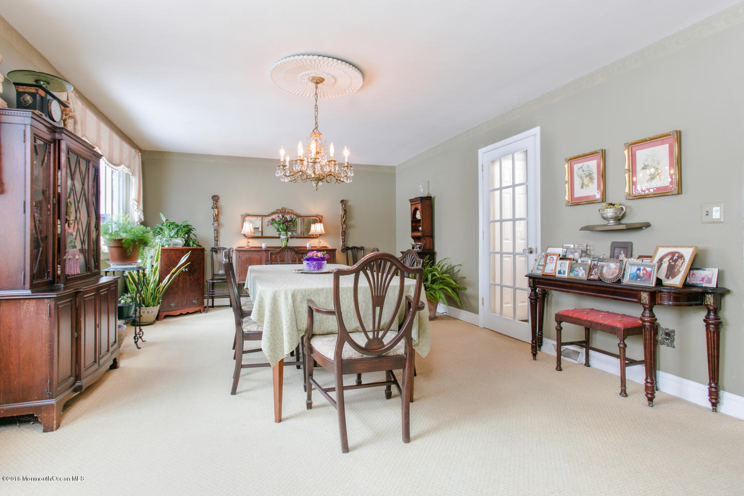 104 Meadowbrook Road Spring Lake Heights, NJ 07762 - Photo 8 of 22 a dining room with furniture a livingroom and chandelier