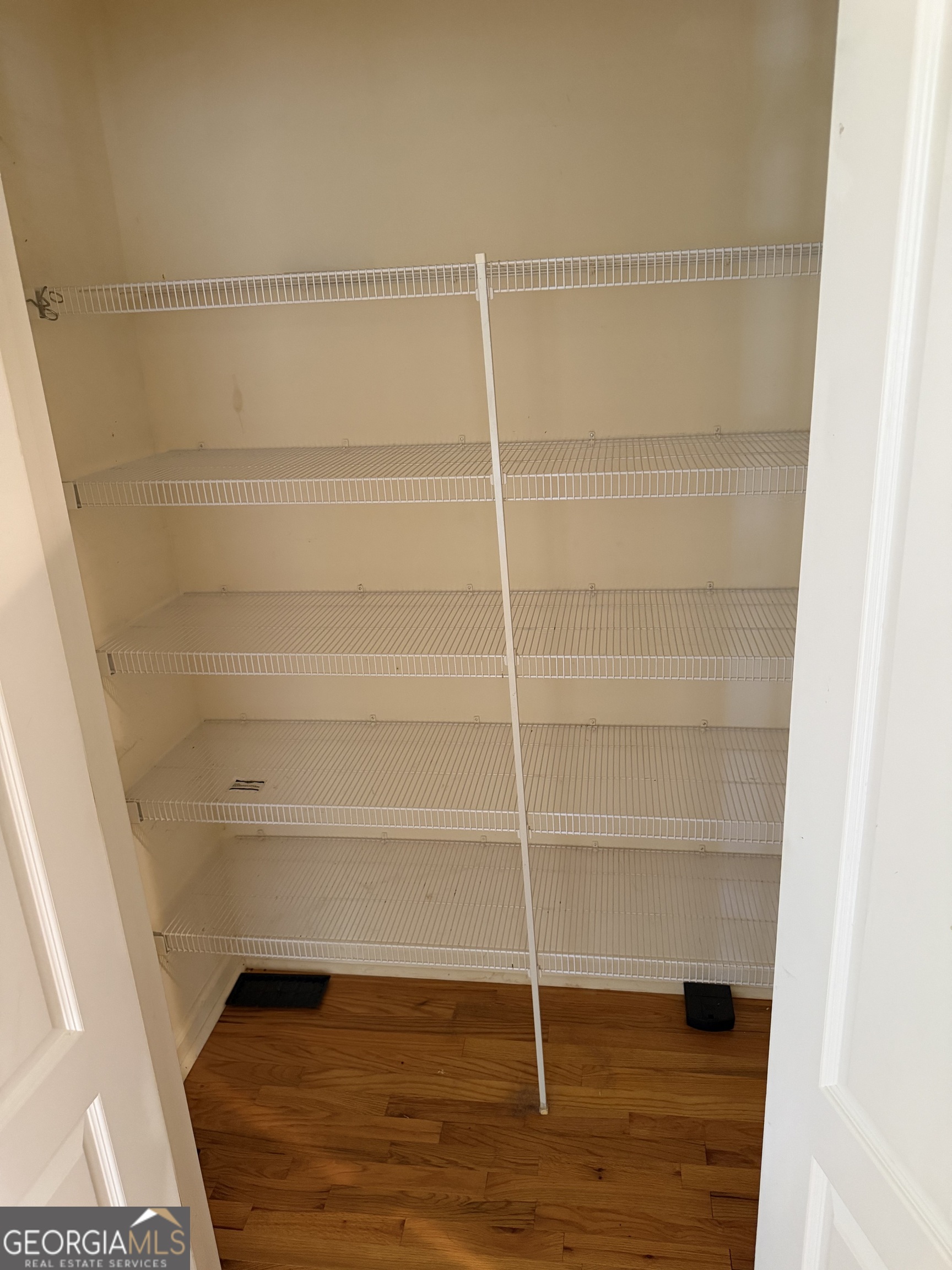 302 Norris Road Barnesville, GA 30204 - Photo 34 of 65 a view of a room with racks on the wall
