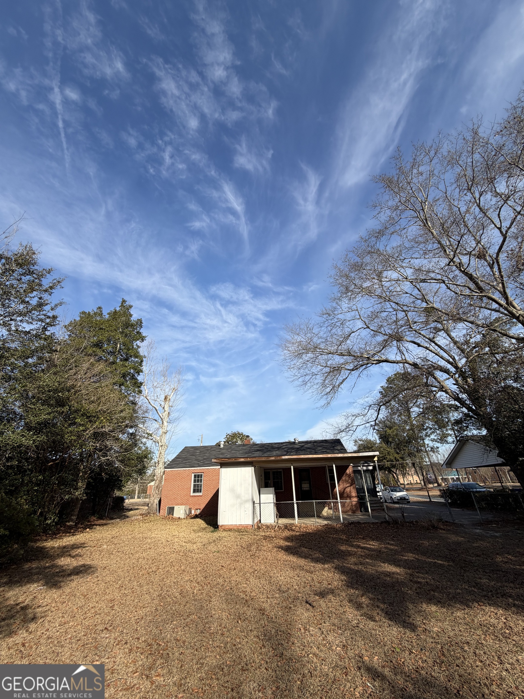 2006 Stonewall Street Dublin, GA 31021 - Photo 2 of 12 a view of a house with a yard