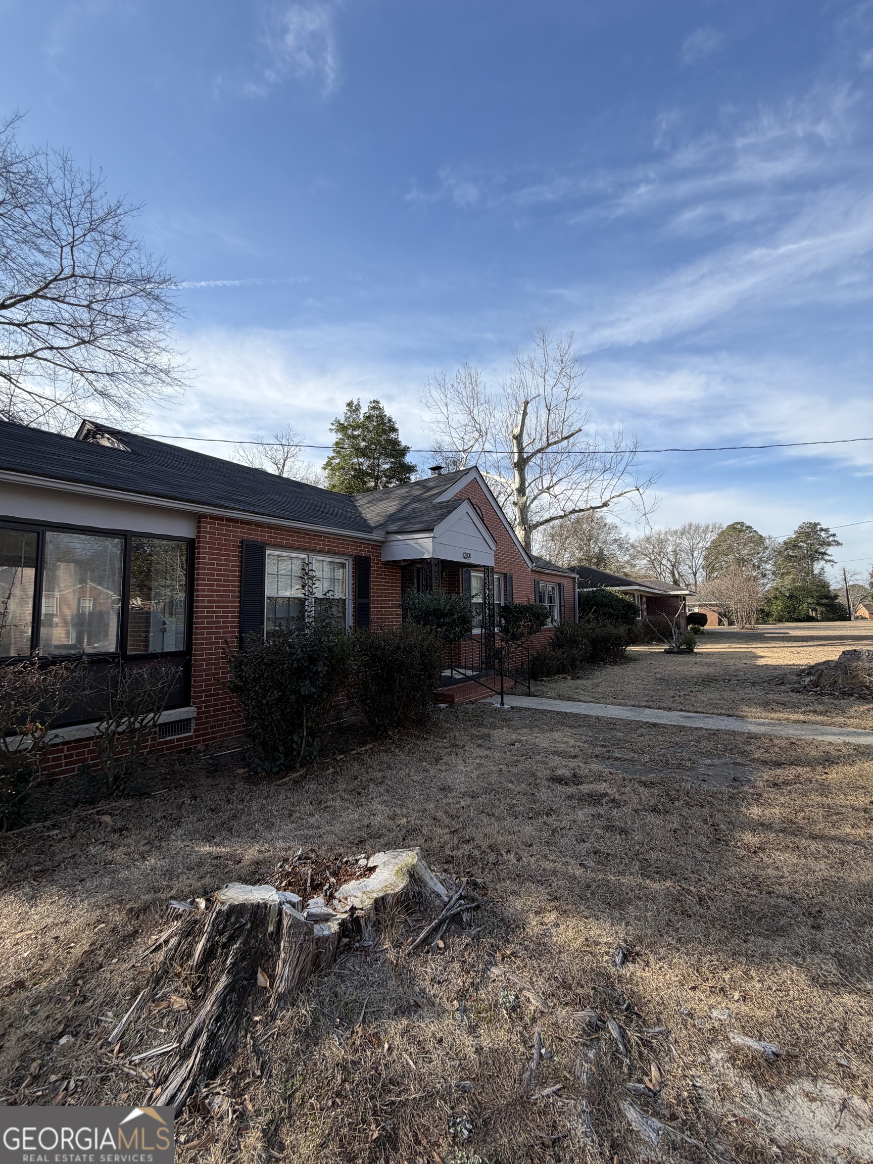 2006 Stonewall Street Dublin, GA 31021 - Photo 4 of 12 a view of a house with a yard