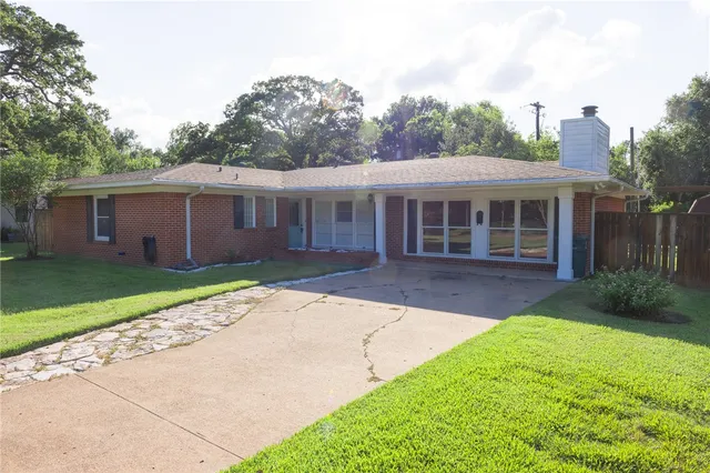 front view of a house and a yard
