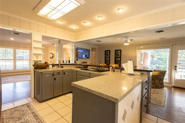 a kitchen with lots of counter space and a sink