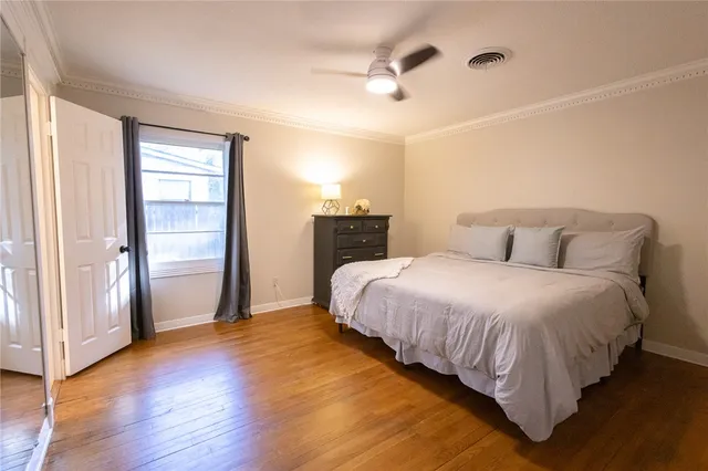 a living room with furniture window and a fireplace