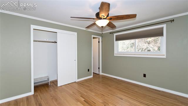 4027 Maxwell Road Colorado Springs, CO 80909 - Photo 26 of 35 Upper level master bedroom, closet and bathroom.
