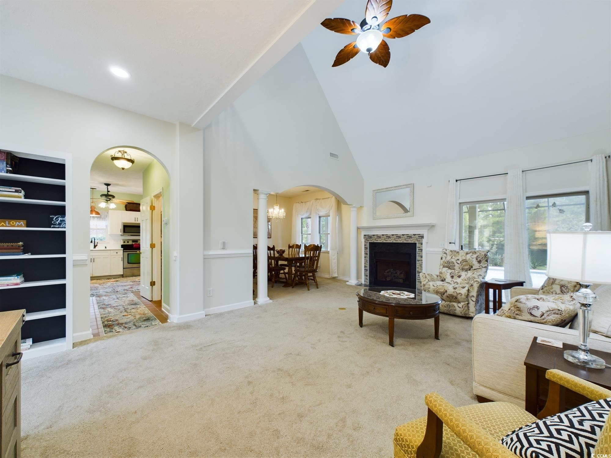 526 Saluda River Road Myrtle Beach, SC 29588 - Photo 27 of 40 Carpeted living room featuring ceiling fan and hig