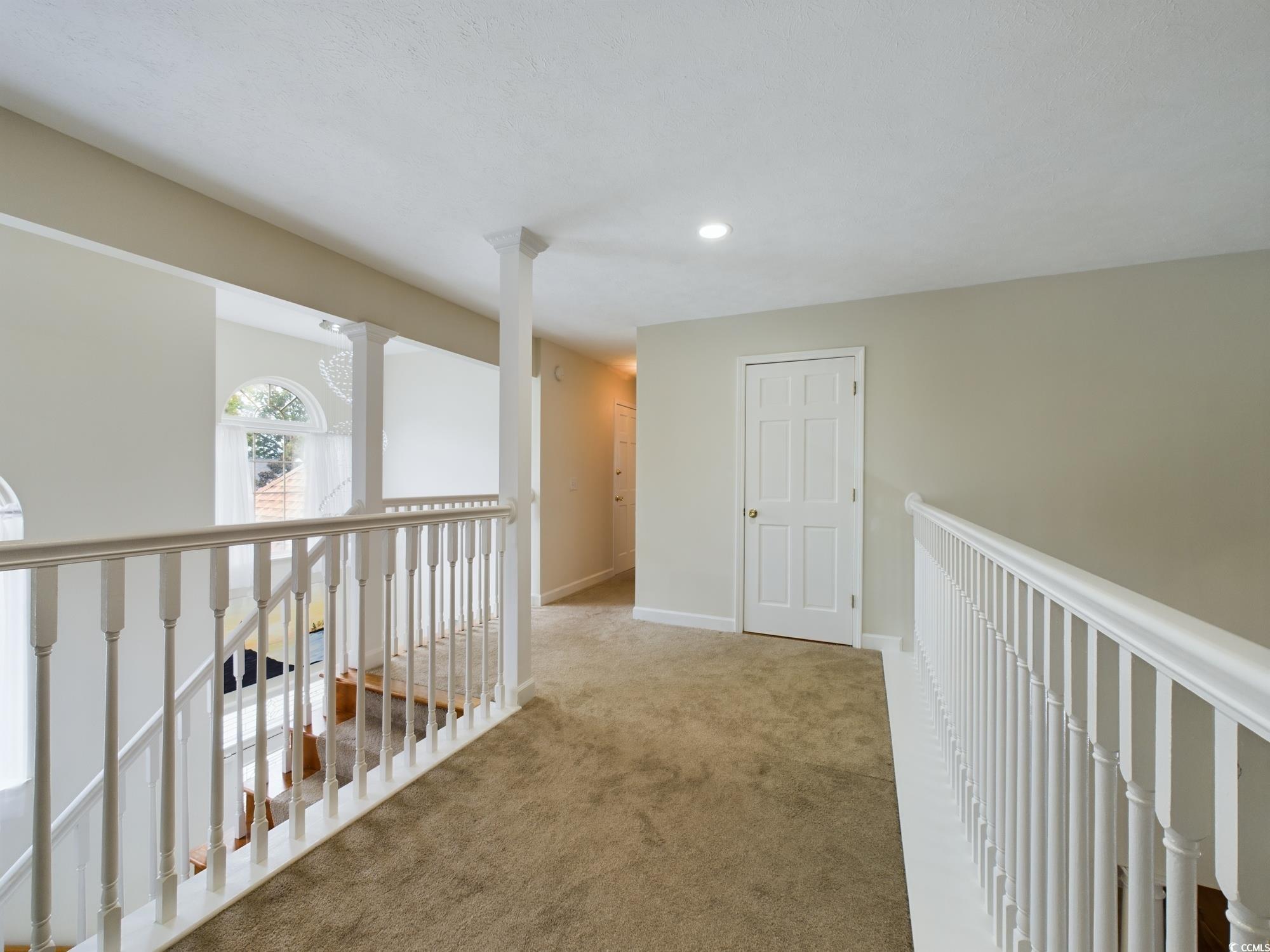 526 Saluda River Road Myrtle Beach, SC 29588 - Photo 29 of 40 Hallway featuring carpet floors