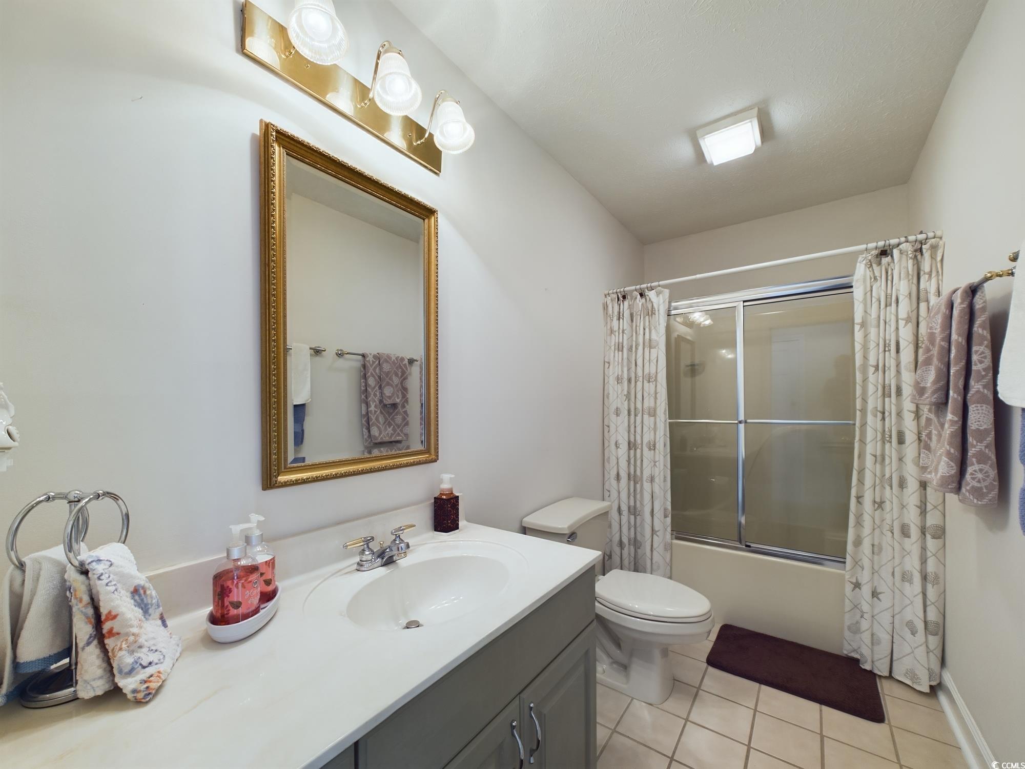 526 Saluda River Road Myrtle Beach, SC 29588 - Photo 34 of 40 Full bathroom featuring shower / bathtub combinati