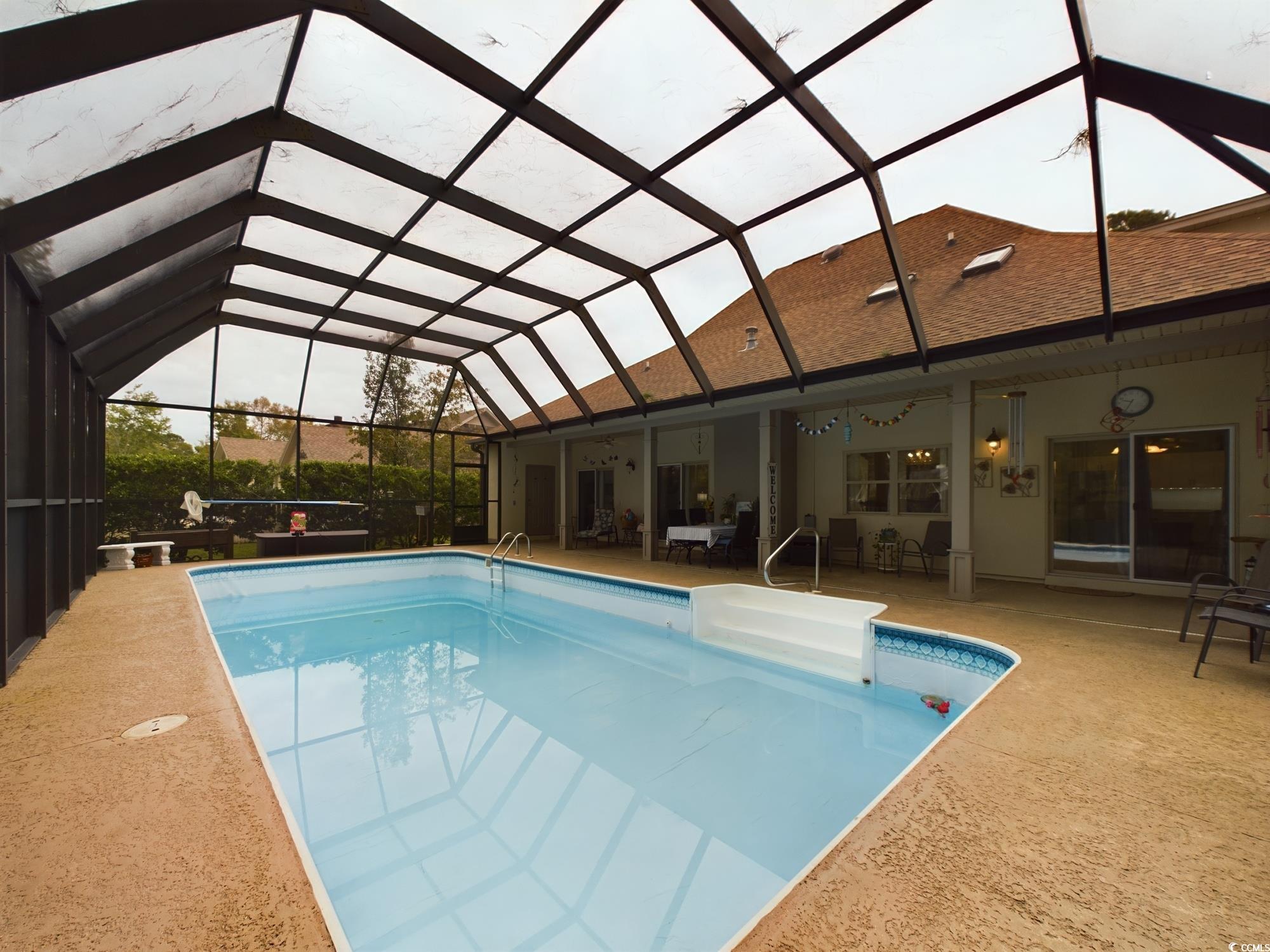 526 Saluda River Road Myrtle Beach, SC 29588 - Photo 6 of 40 View of swimming pool featuring a lanai and a pati