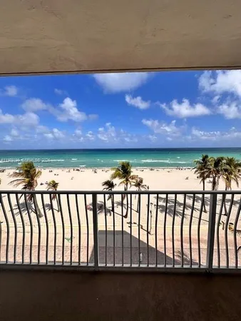 a view of ocean from a balcony