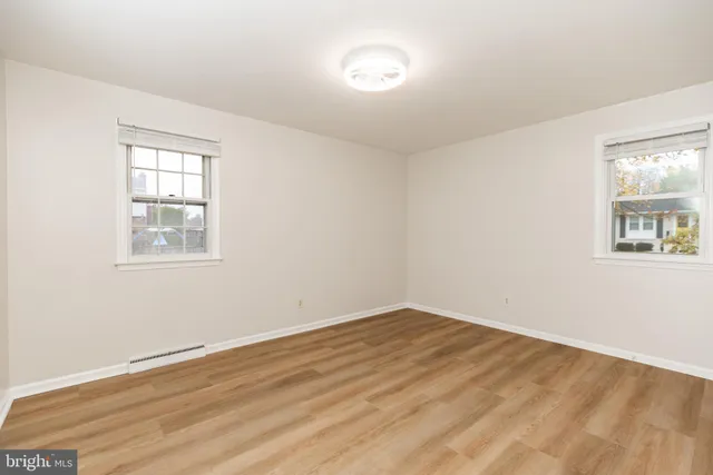 a view of a room that has a window in it