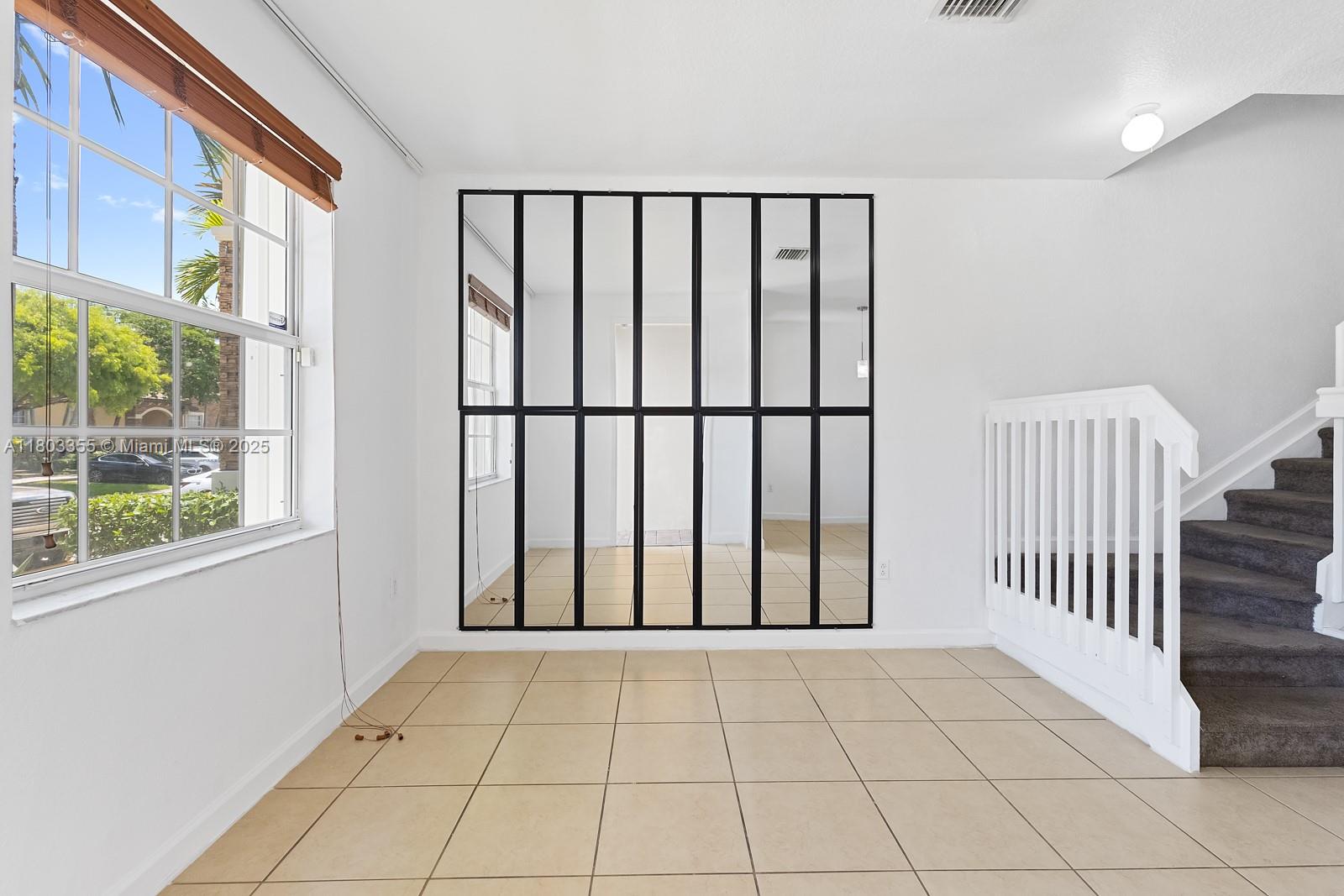 9153 Southwest 227th Street, Unit 3 Cutler Bay, FL 33190 - Photo 12 of 32 a view of a balcony