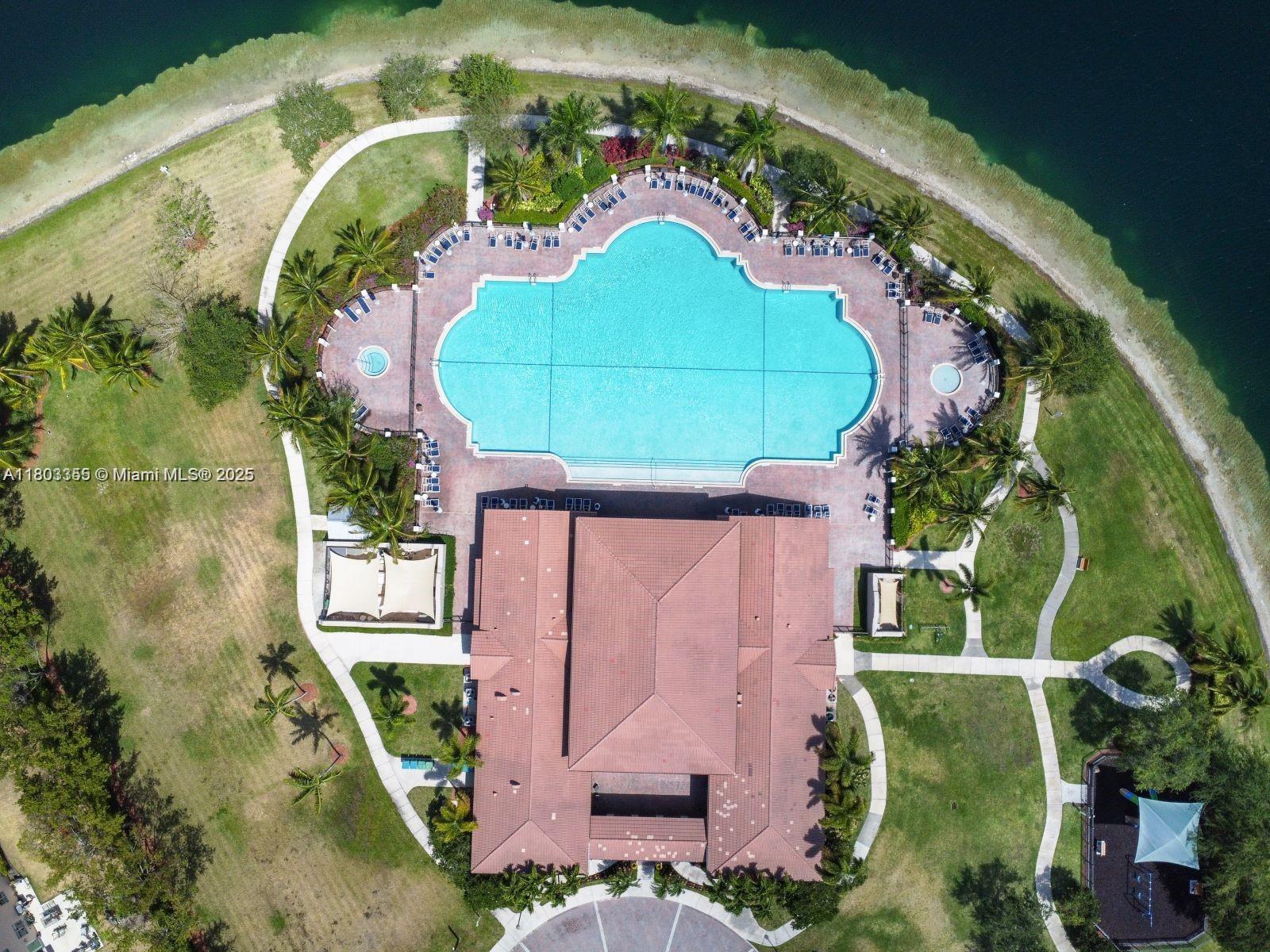 9153 Southwest 227th Street, Unit 3 Cutler Bay, FL 33190 - Photo 22 of 32 an aerial view of a house