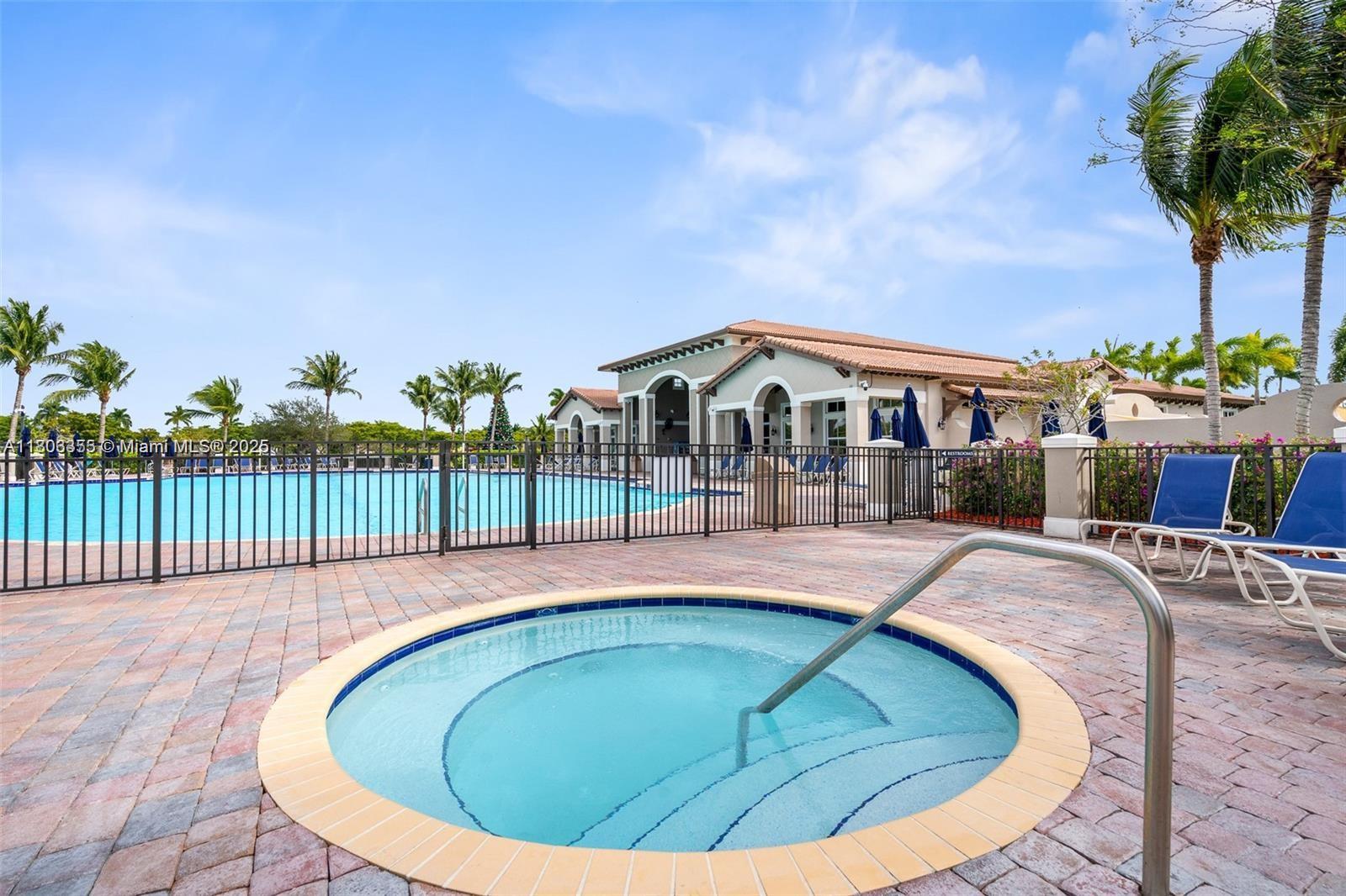 9153 Southwest 227th Street, Unit 3 Cutler Bay, FL 33190 - Photo 24 of 32 a view of swimming pool from a balcony