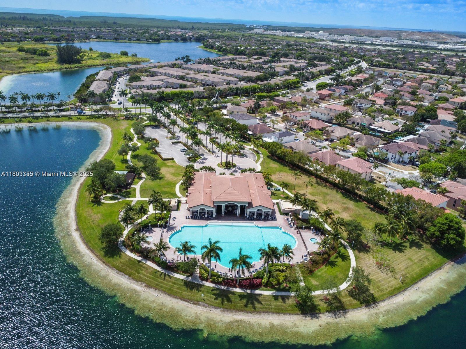 9153 Southwest 227th Street, Unit 3 Cutler Bay, FL 33190 - Photo 7 of 32 an aerial view of a house with a swimming pool yard and outdoor seating