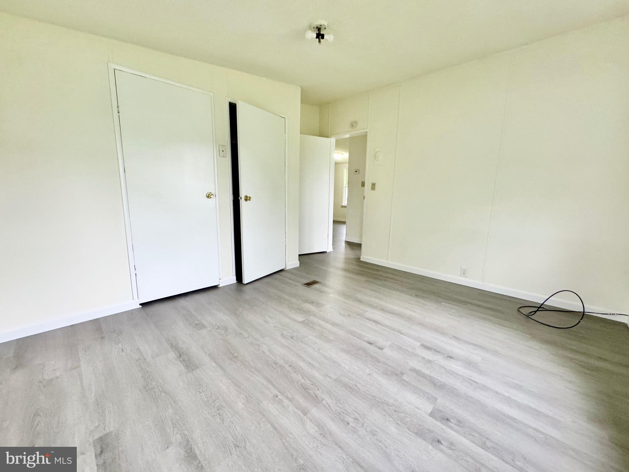 4 Welch Drive Dover, DE 19901 - Photo 19 of 22 a view of empty room with wooden floor