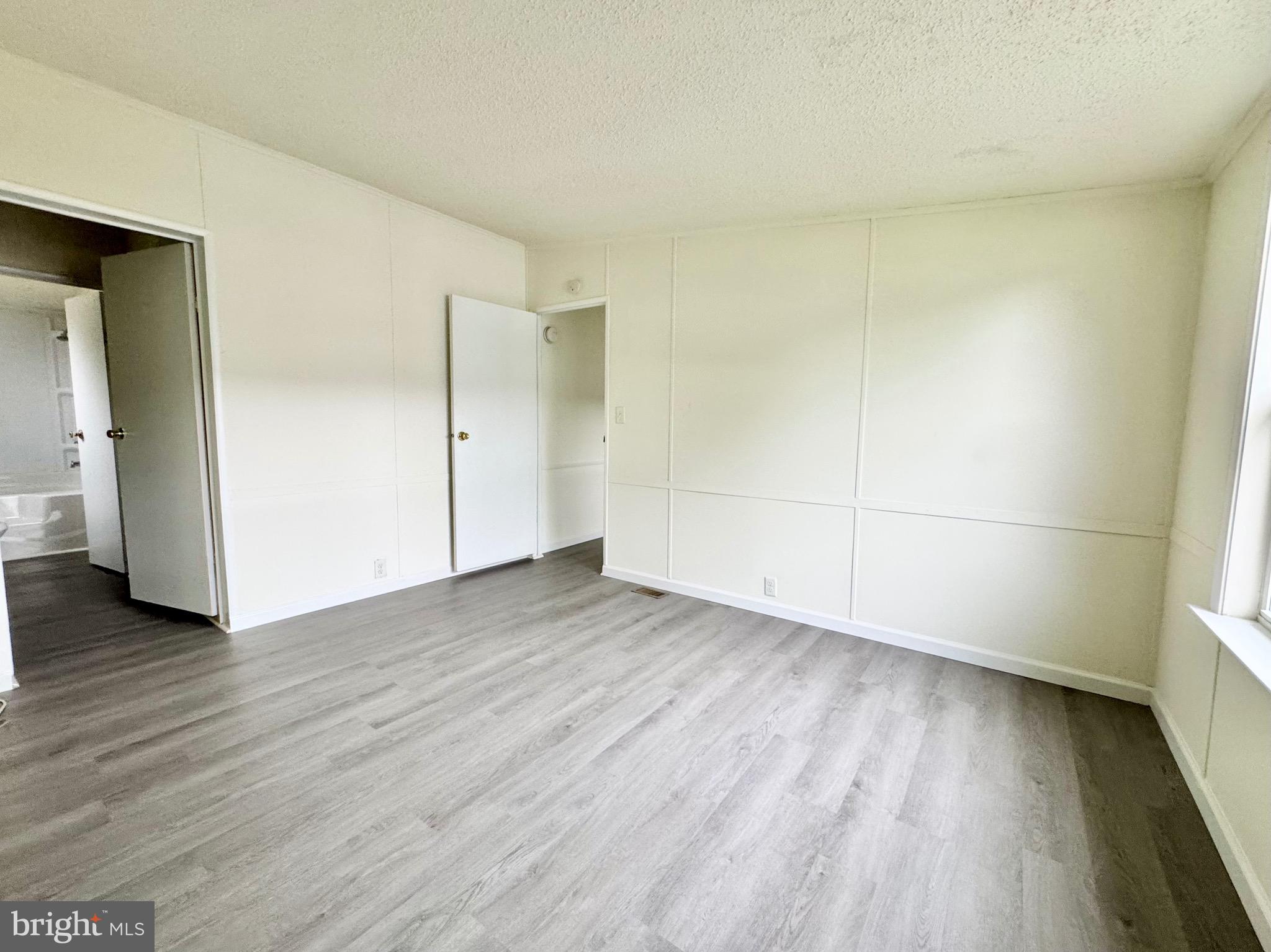 4 Welch Drive Dover, DE 19901 - Photo 6 of 22 a view of a room with wooden floor