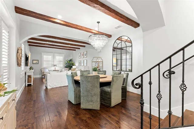 a view of living room kitchen and dining room