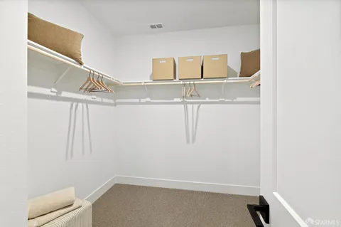 a view of small space with racks on the wall