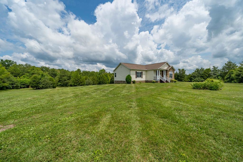 2910 North Wesley Chapel Road Greeneville, TN 37745 - Photo 38 of 40 Left Side Yard
