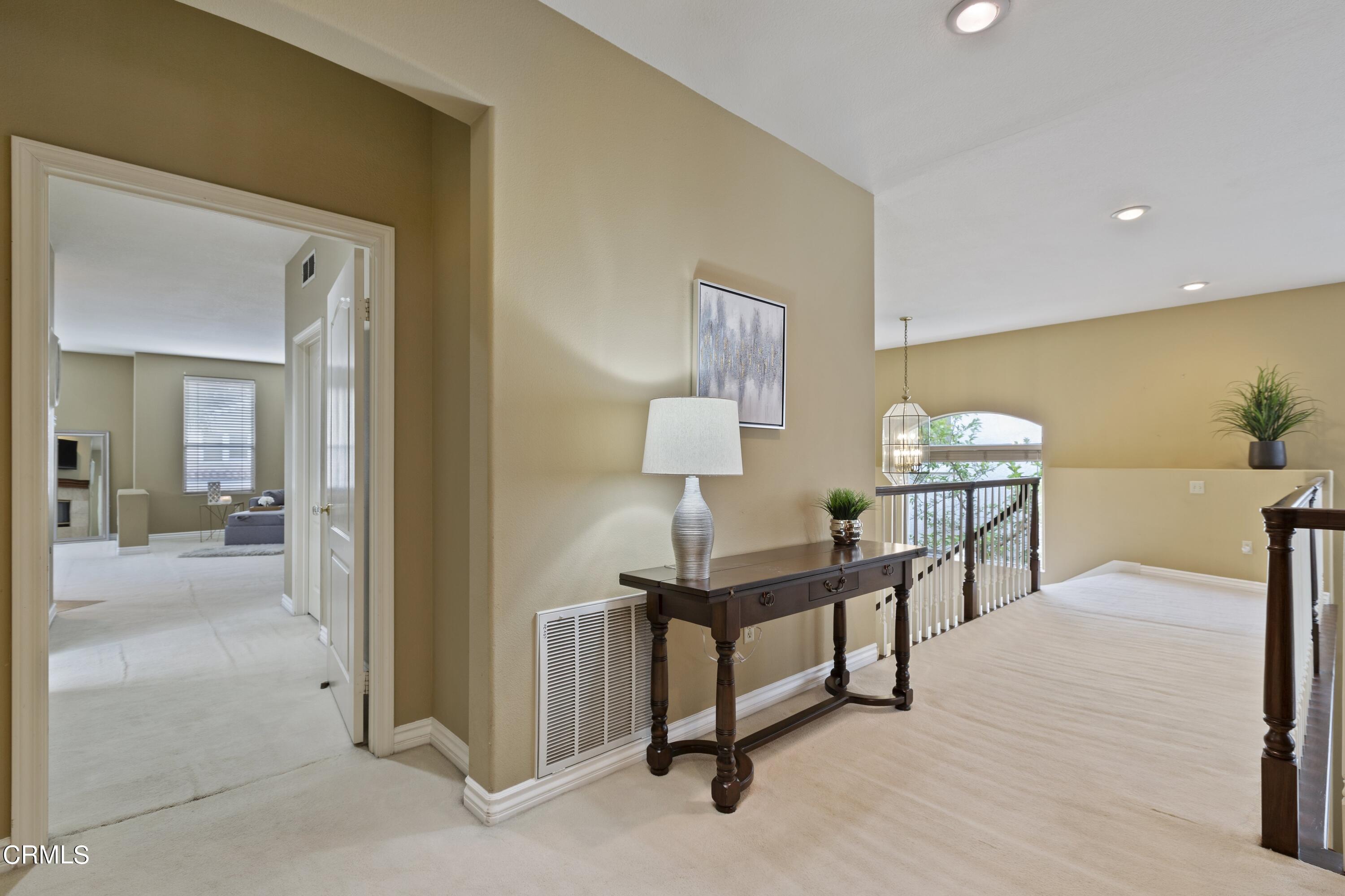 11774 Pinedale Road Moorpark, CA 93021 - Photo 22 of 37 a view of a livingroom with furniture and a table