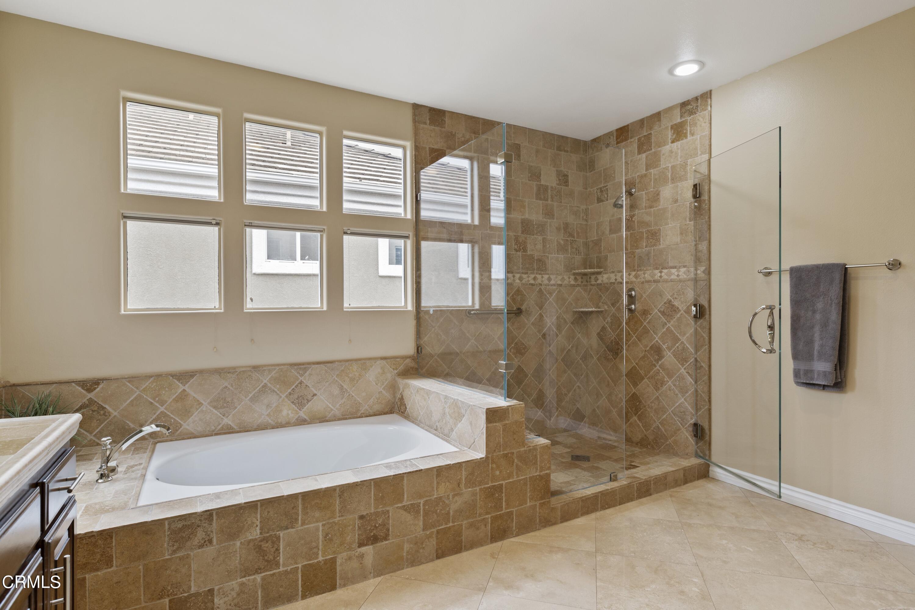 11774 Pinedale Road Moorpark, CA 93021 - Photo 28 of 37 a bathroom with a bathtub and shower