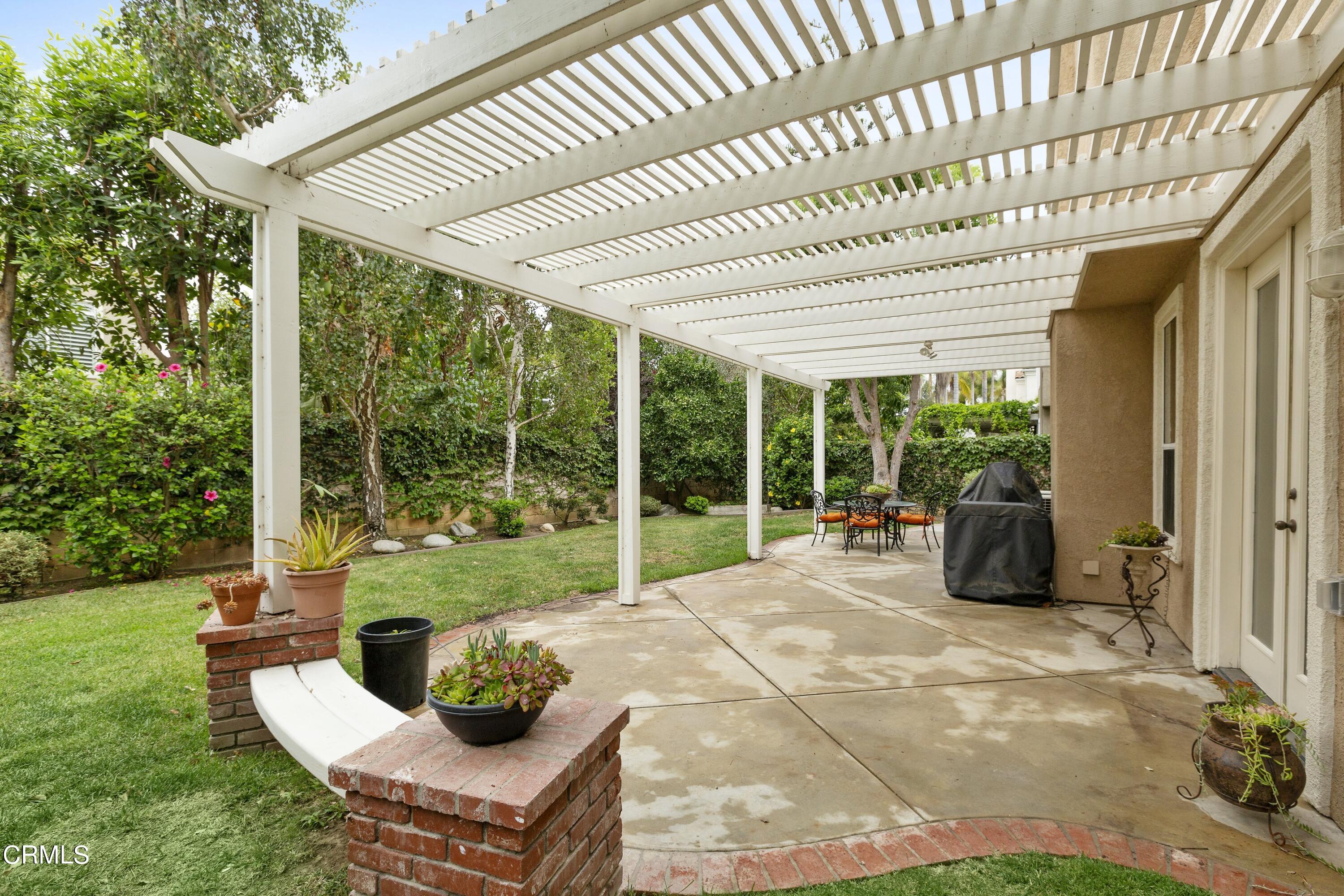 11774 Pinedale Road Moorpark, CA 93021 - Photo 32 of 37 a view of a porch with chairs and backyard