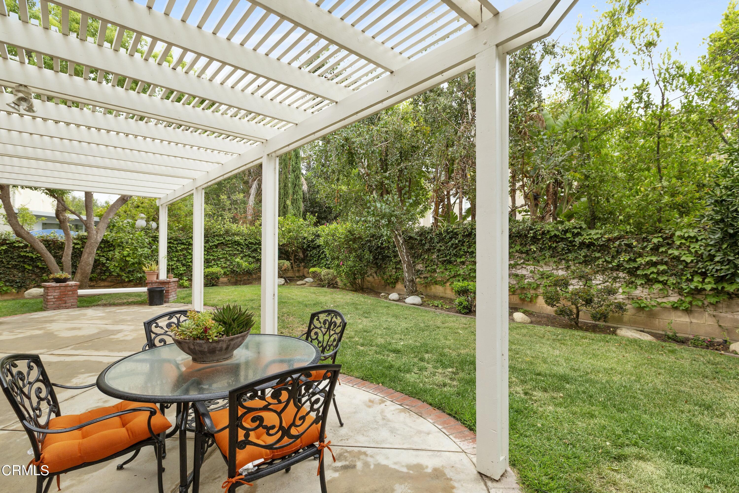 11774 Pinedale Road Moorpark, CA 93021 - Photo 33 of 37 a view of a porch with furniture and a yard