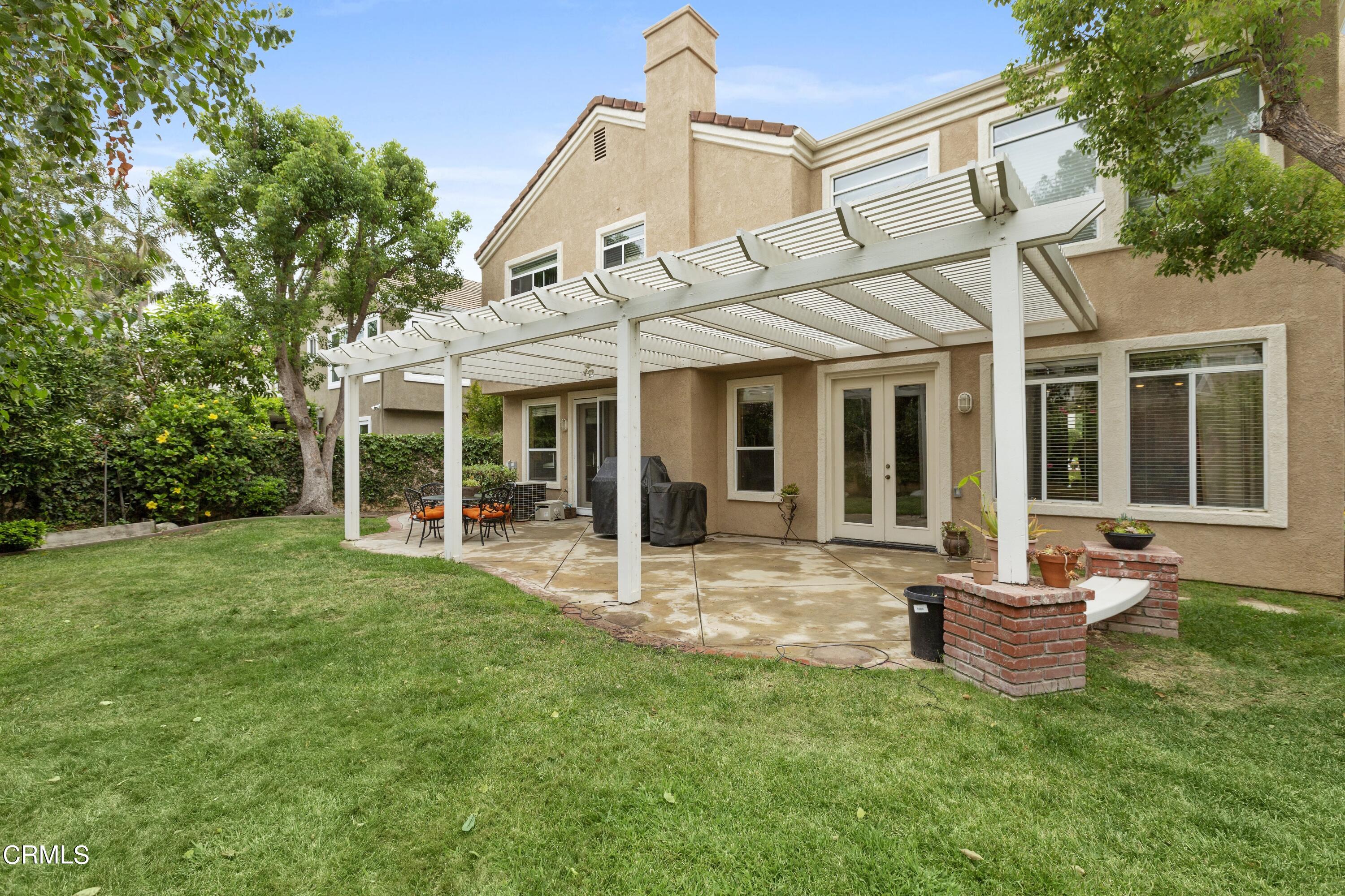11774 Pinedale Road Moorpark, CA 93021 - Photo 35 of 37 a view of a house with backyard porch and sitting area