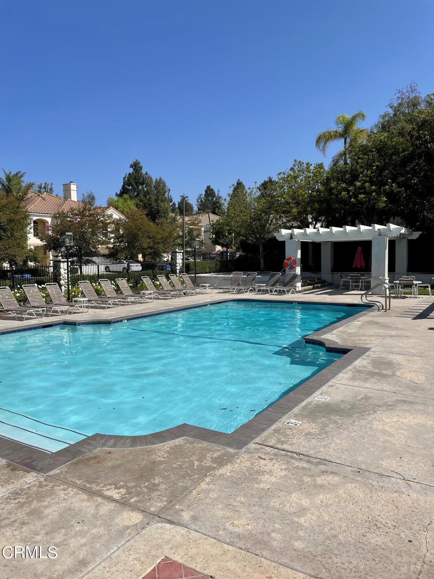 11774 Pinedale Road Moorpark, CA 93021 - Photo 36 of 37 a view of a swimming pool with an outdoor space and seating area