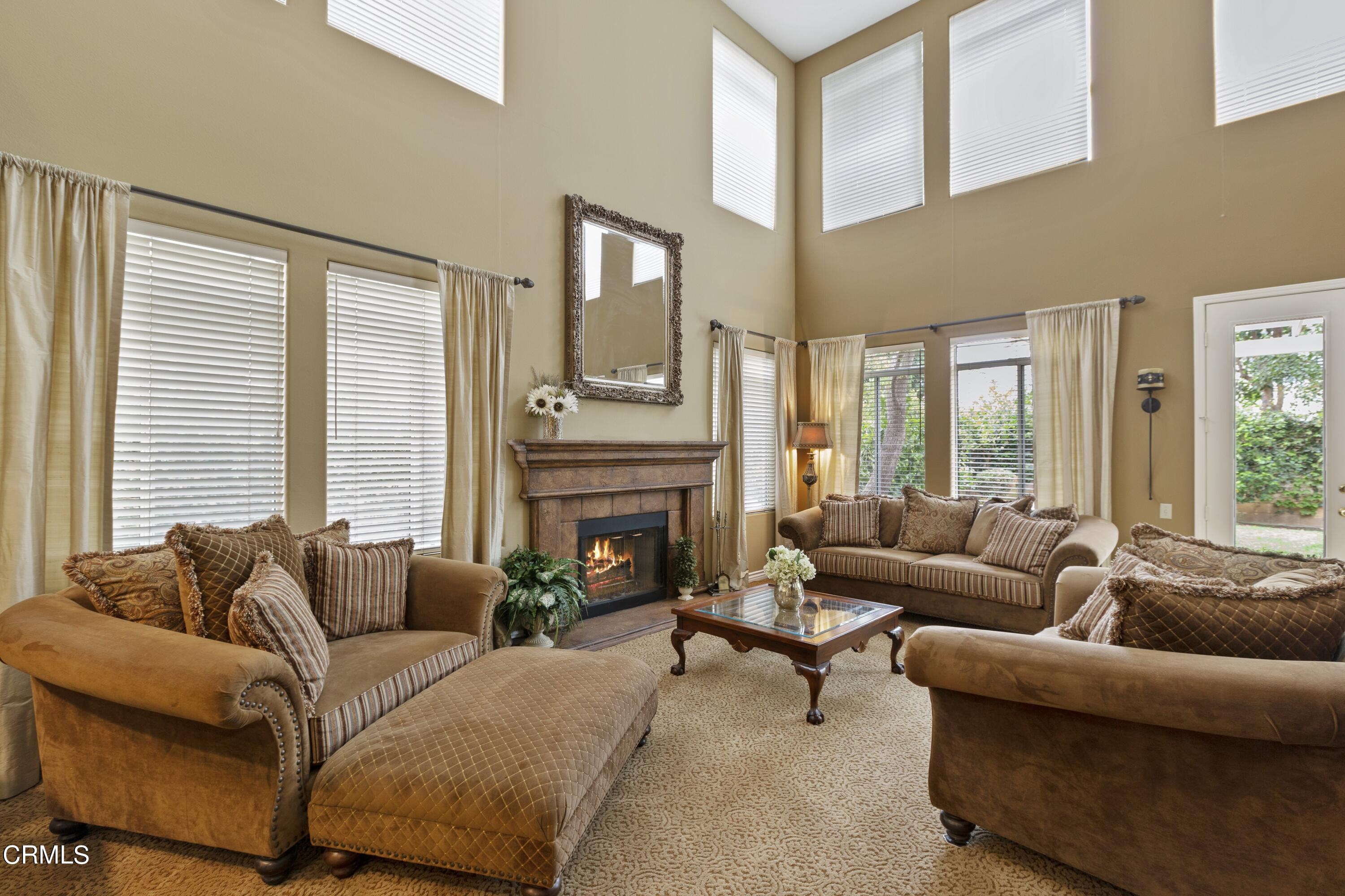 11774 Pinedale Road Moorpark, CA 93021 - Photo 10 of 37 a living room with furniture and a large window