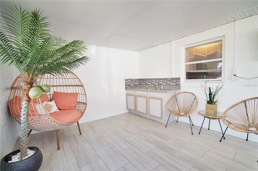 16285 Southwest 21st Court Ocala, FL 34473 - Photo 30 of 40 a workspace with furniture and wooden floor