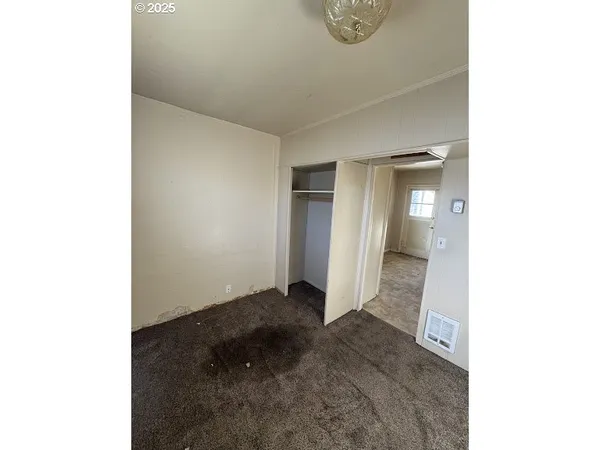 a view of a room with an empty space