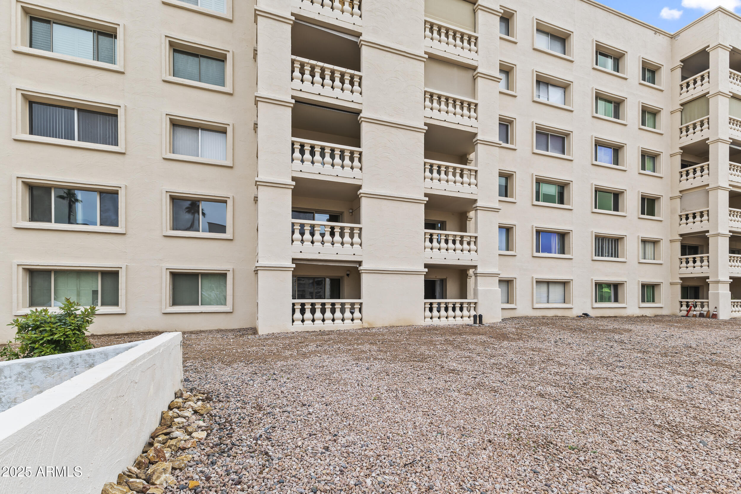 7920 East Camelback Road, Unit 303 Scottsdale, AZ 85251 - Photo 21 of 45 a front view of a building