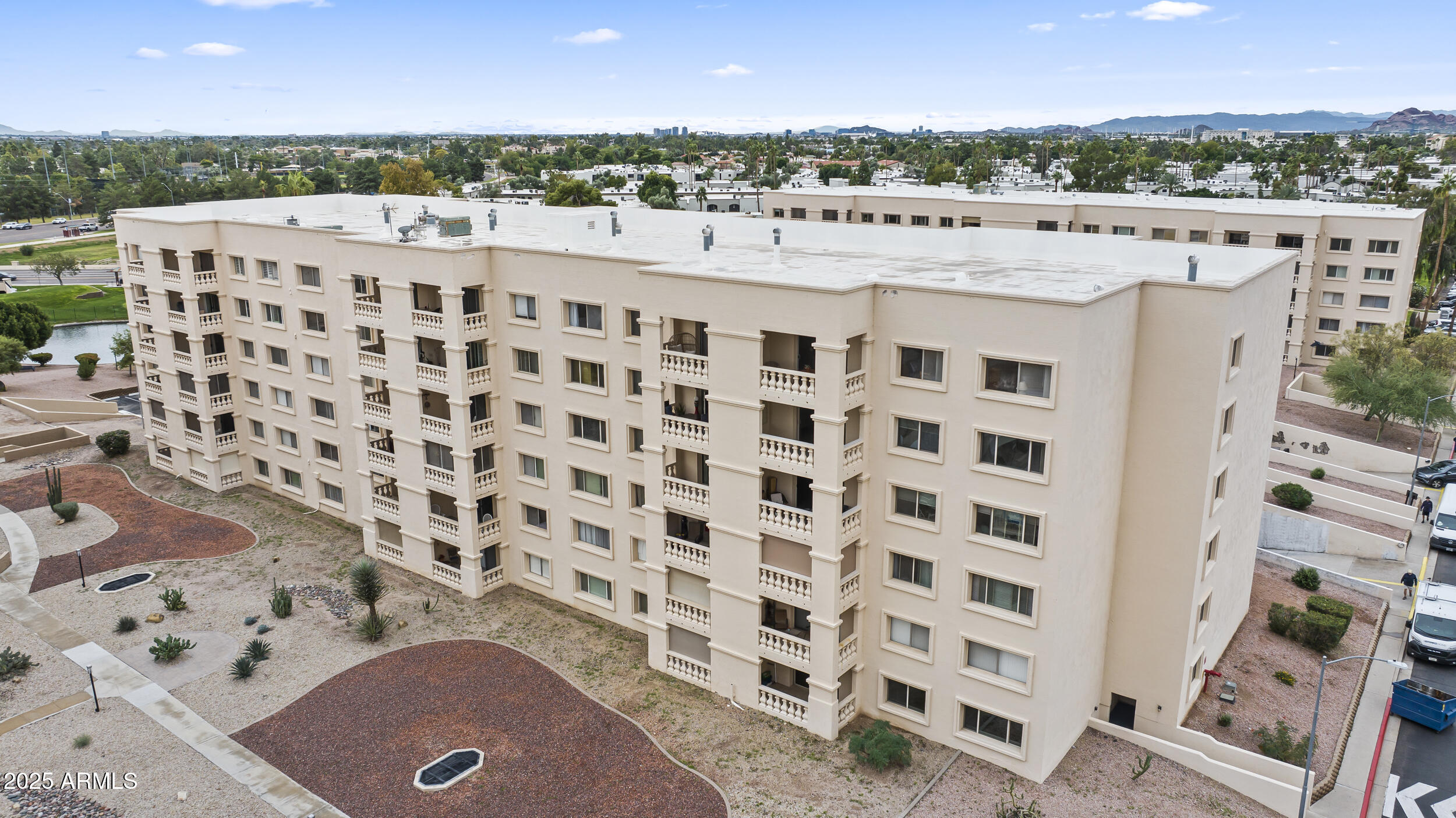 7920 East Camelback Road, Unit 303 Scottsdale, AZ 85251 - Photo 37 of 45 a view of a building with an outdoor space