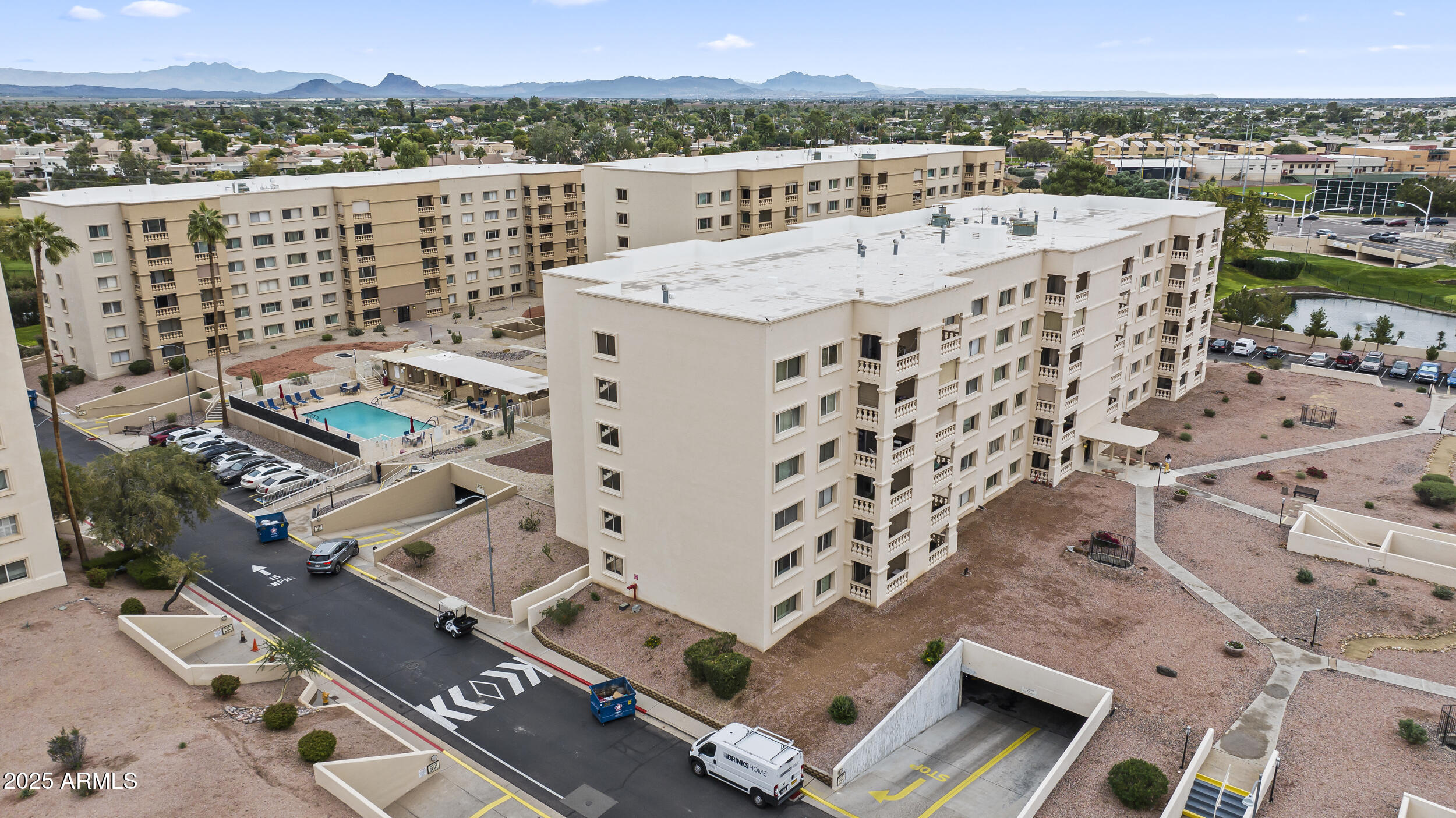 7920 East Camelback Road, Unit 303 Scottsdale, AZ 85251 - Photo 38 of 45 an aerial view of a house with a city view