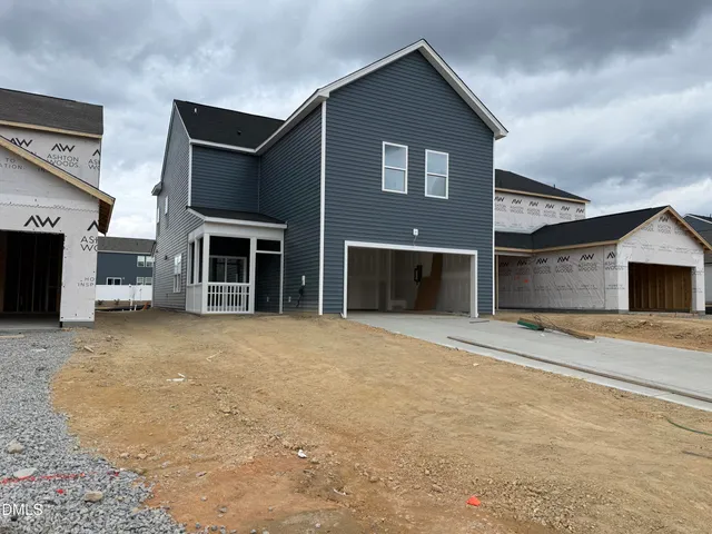 a kitchen with granite countertop a sink and a stove