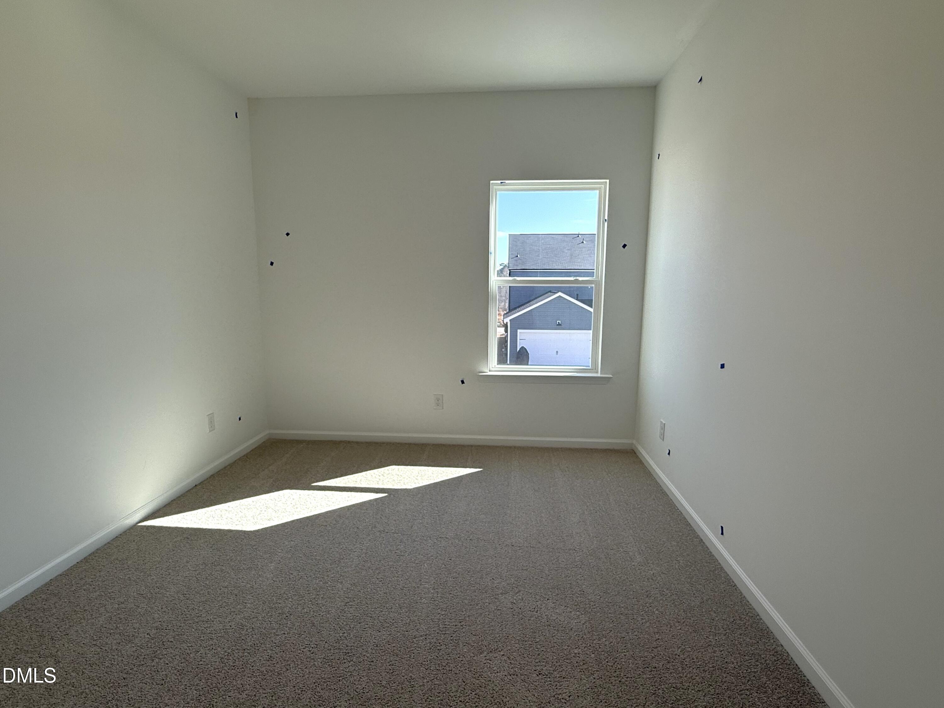 2840 Quarry Road, Unit 174 Rolesville, NC 27571 - Photo 14 of 30 an empty room with a window