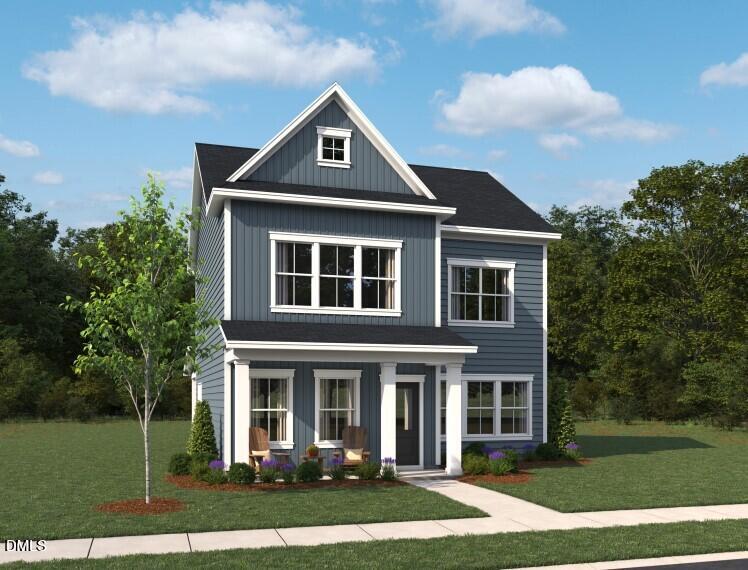 2840 Quarry Road, Unit 174 Rolesville, NC 27571 - Photo 2 of 32 a front view of a house with a yard