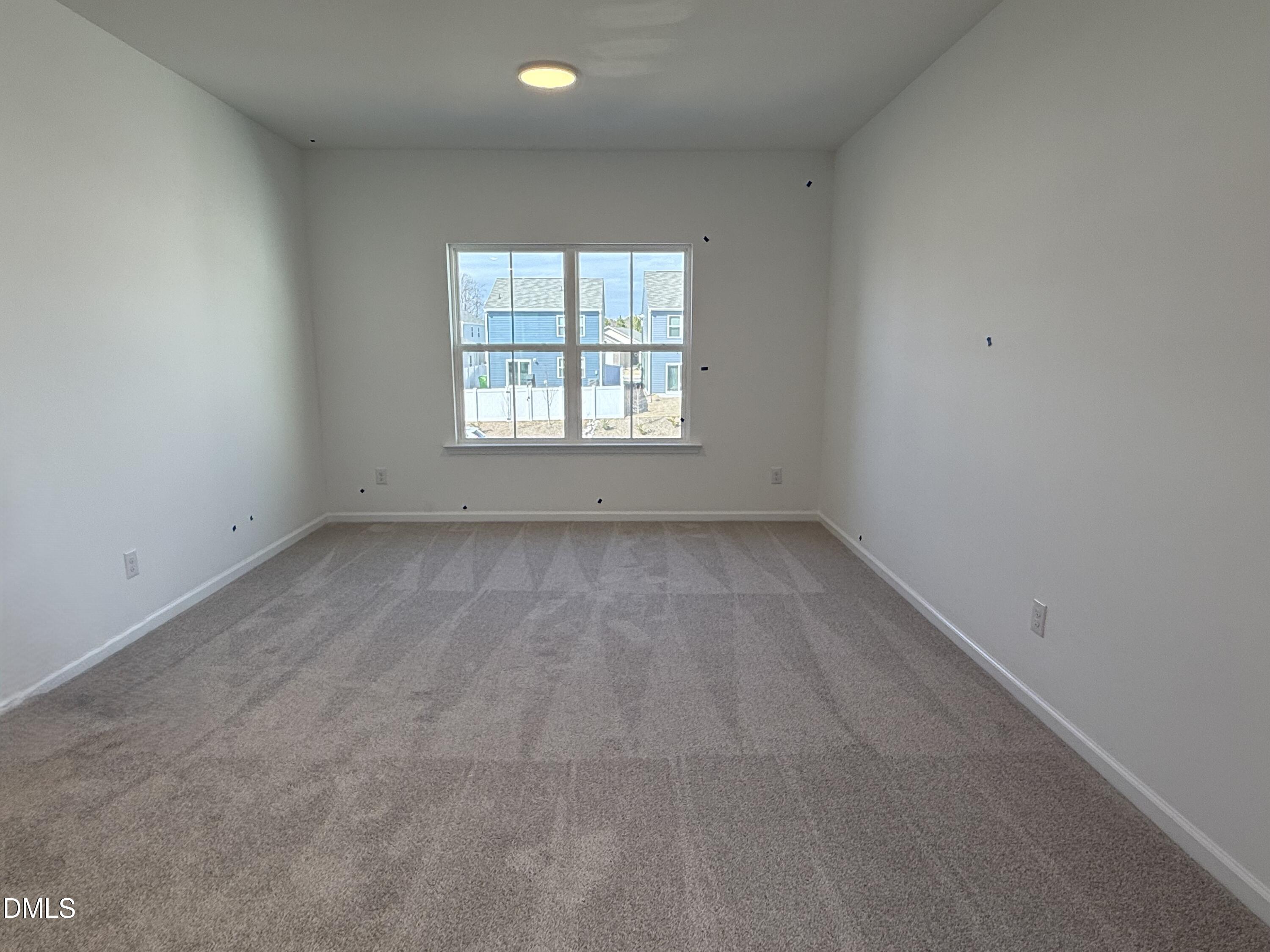 2840 Quarry Road, Unit 174 Rolesville, NC 27571 - Photo 30 of 30 an empty room with a window