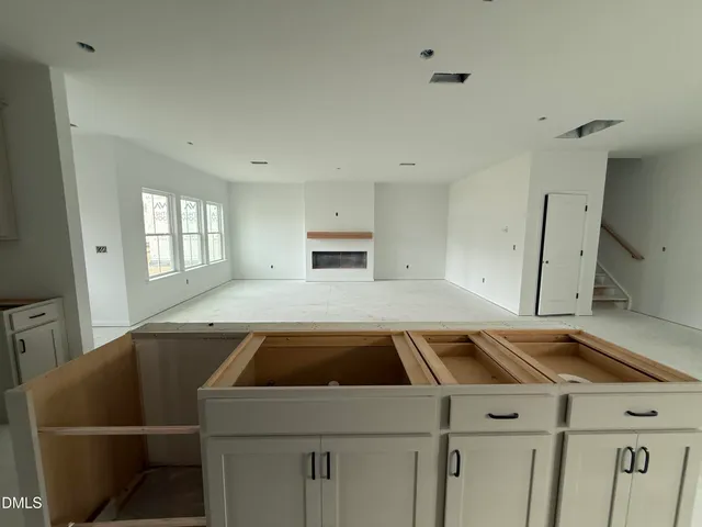 a view of a livingroom with a furniture and fireplace