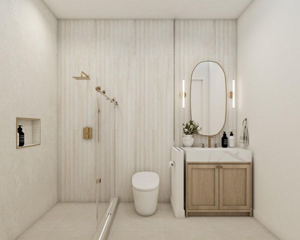 a bathroom with a toilet a sink and mirror