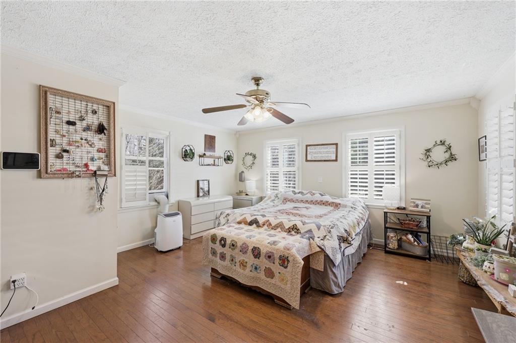 4005 Price Road Gainesville, GA 30506 - Photo 23 of 49 a bedroom with a bed and a table in it