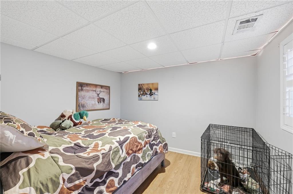 4005 Price Road Gainesville, GA 30506 - Photo 37 of 49 a bedroom with a bed and a window