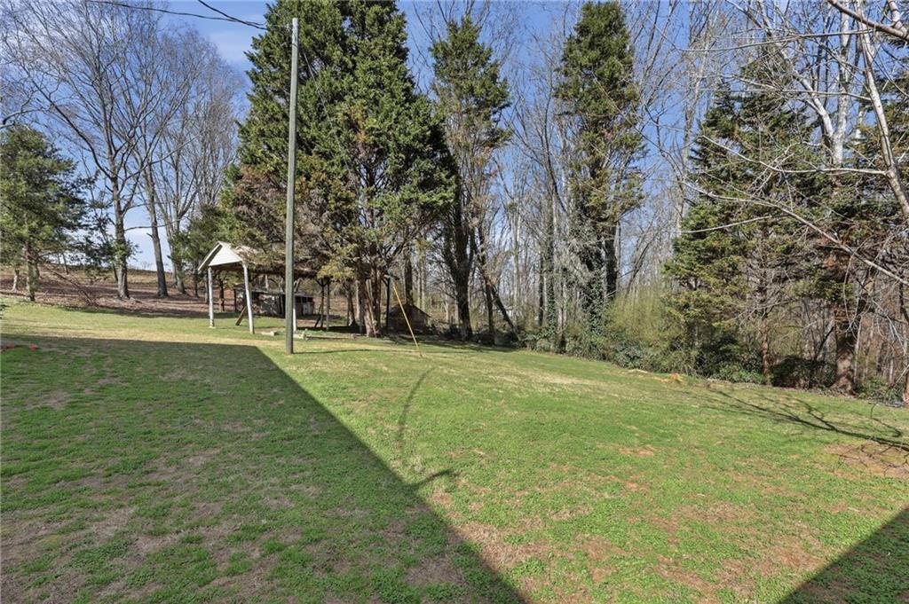 4005 Price Road Gainesville, GA 30506 - Photo 38 of 49 a view of a trees with a yard
