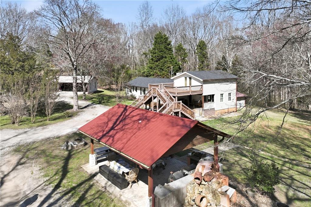 4005 Price Road Gainesville, GA 30506 - Photo 8 of 49 a view of a chairs and table on the deck