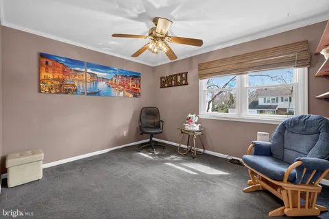 a room with furniture and a window